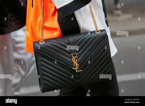 ysl white bag with black logo
